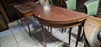 Une table demi-lune de style Louis XVI en placage d'acajou (…