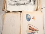 a drawing of a man laying on the floor next to a book