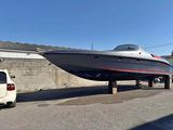 a boat that is sitting on top of a car