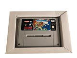 a nintendo game in a white box on a white surface
