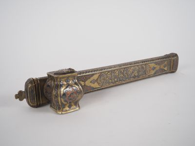 an old brass door handle on a white background