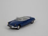 a toy car that is sitting on a white surface