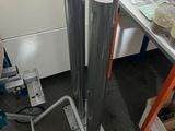 a metal pole with a number on it in a room