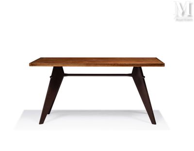 a wooden table with black legs and a wooden top