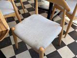many chairs and a table in a room