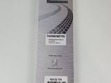 a close up of a package of tire treads on a white surface