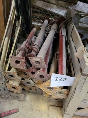 a lot of different types of pipes in a crate