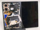 a picture of a laptop with a broken screen
