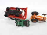 two toy vehicles that are sitting next to each other
