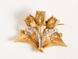 yellow gold and diamond broochle with leaves and flowers