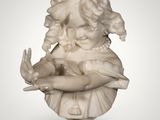marble bust of a boy holding a bird on a pedestal