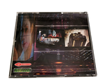 a picture of a cd case with a picture of a woman on it