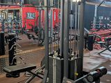 an image of a gym with a lot of equipment