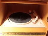 a record player sitting on top of a turntable