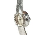 an image of a close up of a watch on a white background