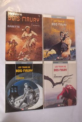 Trois livres consacrés à Star Wars sont exposés sur une surface blanche