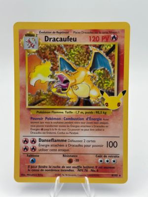 a close up of a pokemon card on a white surface