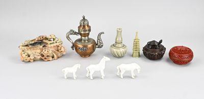 a lot of small figurines that are on the table