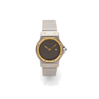 a close up of a watch on a white surface with a white background