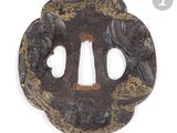 a picture of a tsuba with a design on it