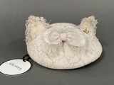 a white cat shaped bag with a tag on it