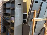 several pieces of metal are stacked on top of each other in a warehouse