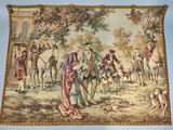 une image représentant une tapisserie sur laquelle figure un groupe de personnes à cheval
