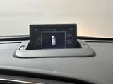 a picture of a car dashboard with a display on it