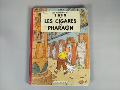 livre pour enfants français, *Les cigares du pharaon*, avec l'illustration d'un homme et d'un chien