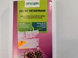 an image of a bottle of enzypain gel with water on it
