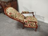 a chair that is sitting in the corner of a room