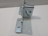 a picture of a metal door latch on a white surface