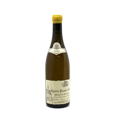 a bottle of wine that is sitting on a table