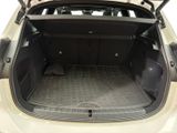a trunk of a car with the back door open