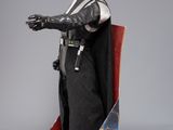 a toy figure of dart vader in a cardboard box