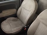 two seats in the back of a car with a seat belt