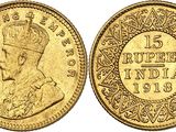 a gold coin with the image of a man wearing a crown