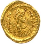 une pièce d'or portant l'image d'un homme