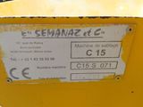 the label on the back of a machine that is sitting on the ground