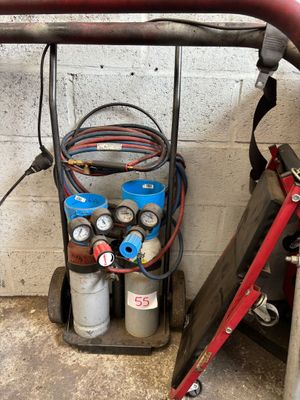 an image of a fire hydrant with a hose attached to it