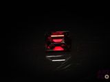 une tourmaline rouge qui brille dans le noir