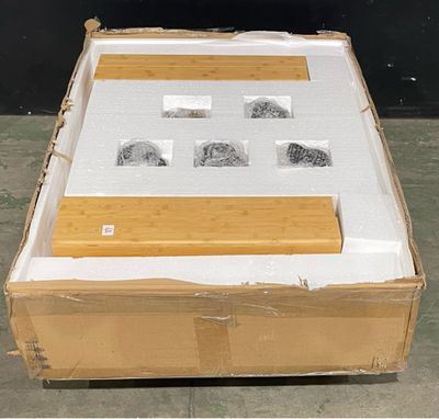 a cardboard box that has a picture of a man on it