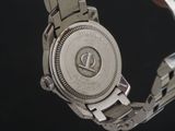 a close up of a wrist watch with a metal band