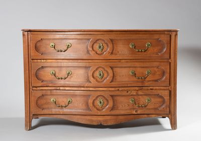 an image of a wooden chest of drawers with brass handles