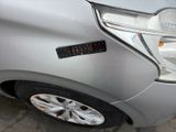 a close up of a car with a sticker on it