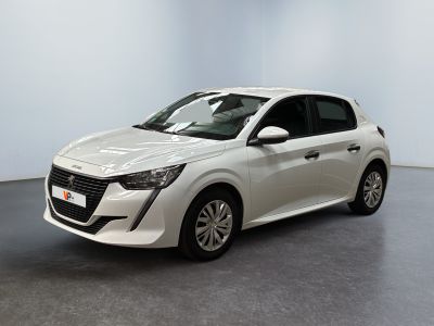 the white car is parked in a room with a gray floor