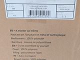the back of a cardboard box with a price label on it