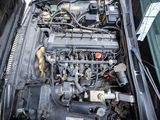 a car engine that is in the trunk of a car