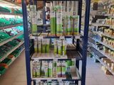 a rack with many different products in it in a store