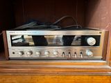 a radio that is sitting on top of a dresser